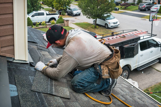Professional Gutter Repair And Installation technician working in Hasbrouck Heights, NJ